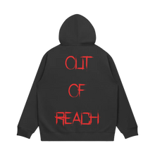Load image into Gallery viewer, Black hoodie with red text 'OUT OF REACH' on the back against a white background

